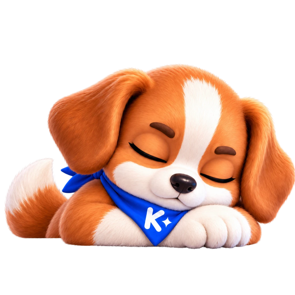 Kito đeo khăn xanh K✦ bên máy tính trên một mặt bàn chung.